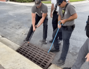 Firefighter preparing to enter the storm drain
